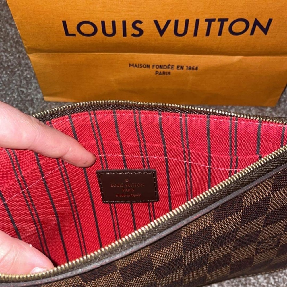 Louis Vuitton pouch with wristlet